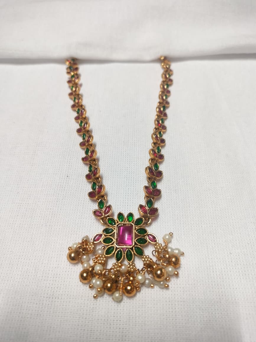 Beads and gemstone necklace